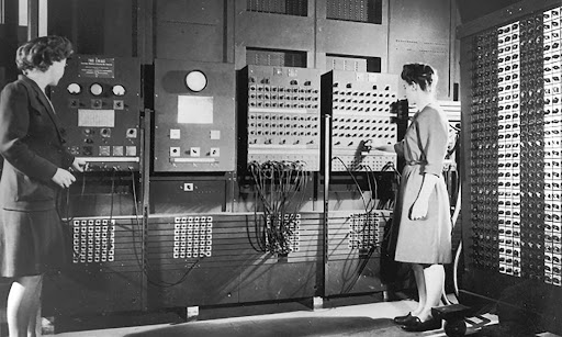 Betty Snyder and Betty Jennings with the first computer